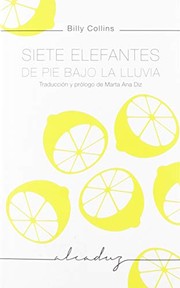 Siete elefantes de pie bajo la lluvia